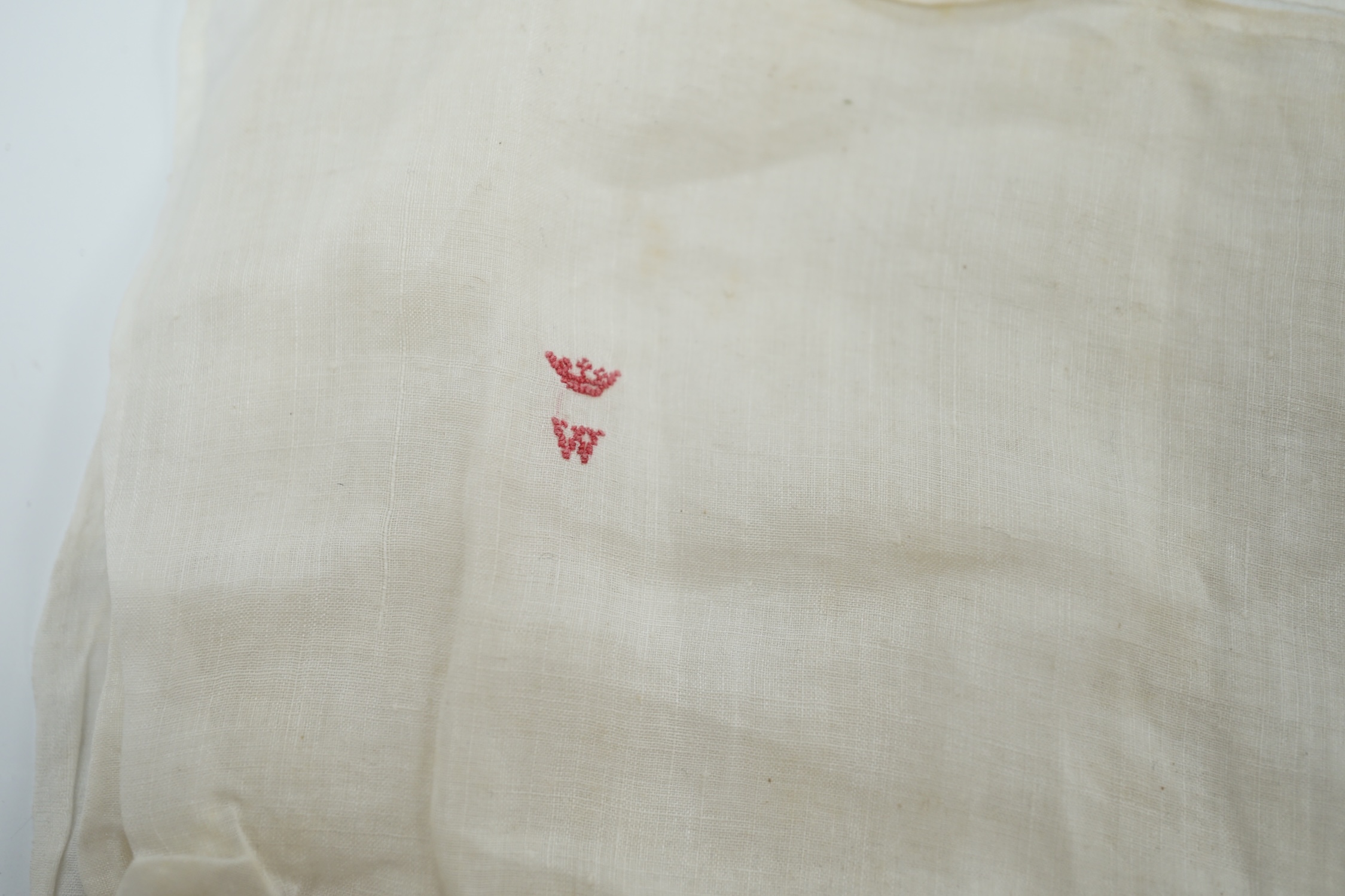 Two handkerchiefs each bearing an embroidered ‘W’ below a coronet, understood to be for the Duke of Wellington, 36 x 34cm. Condition - fair, some staining and foxing